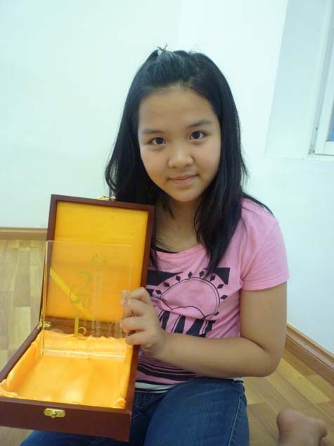 Cô bé 11 tuổi Lê Diệu My là gương mặt xuất sắc nhất của Việt Nam giành giải Đặc biệt tại Liên hoan Văn hóa - Nghệ thuật Thiên Tân - Trung Quốc 2012 (Ảnh Thu Hòe)